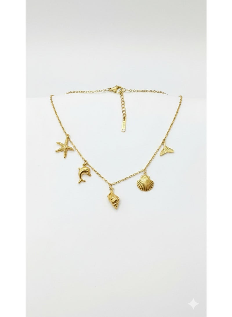 ورد سلسلة ستانلس ستيل ذهبية بتصميم عناصر البحر - دلايات صدف ودولفين. - Image 4